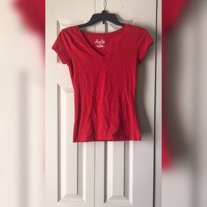 V-neck tight red t-shirt. 95% cotton, 5% spandex